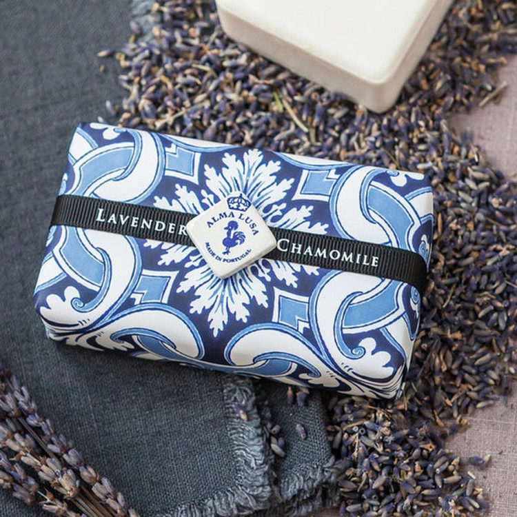 Scented with a harmonious fusion of Lavender & Chamomile - a soothing and enchanting perfume, the soaps are hand wrapped by our craftswomen in papers sporting Portuguese tile motifs.